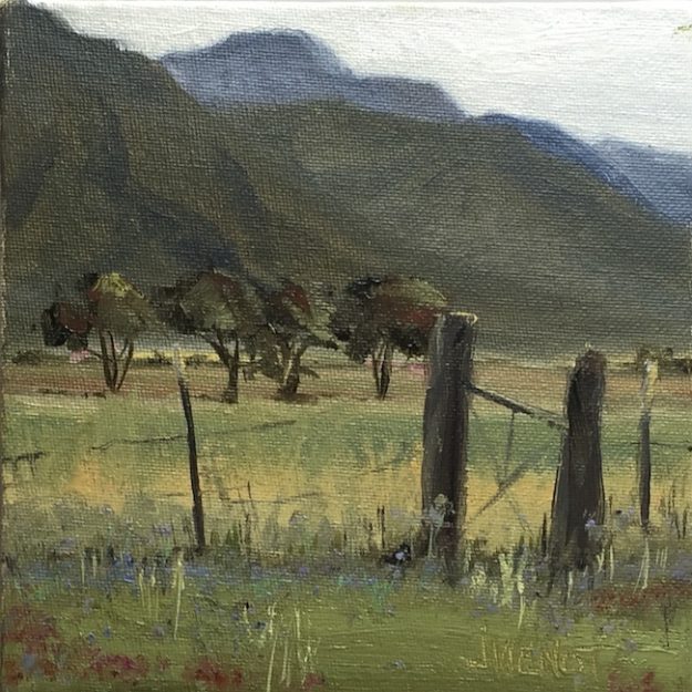 Oil painting of the wildflowers and fenced meadow at Overland Sheepskin Co, north of Taos, NM